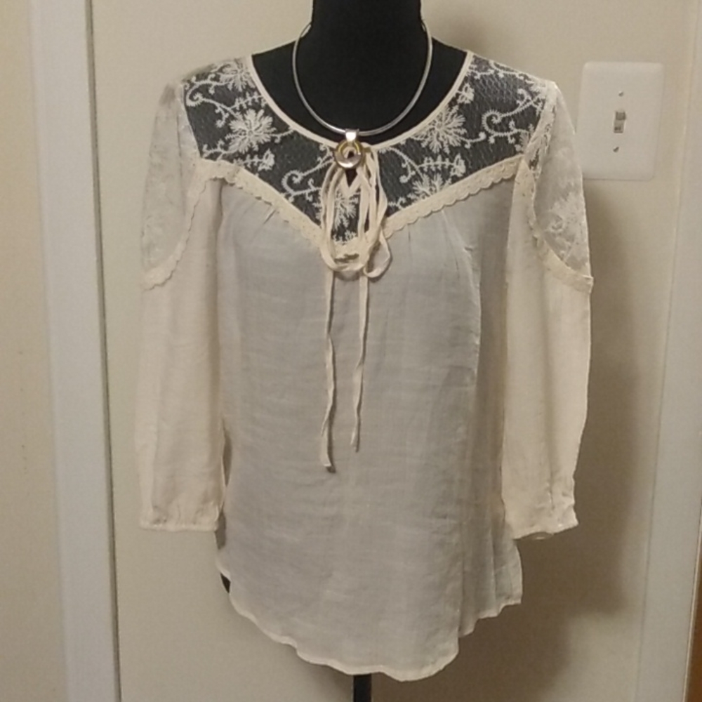 C) EM Long sleeve medium lace front blouse. Great for spring and summer